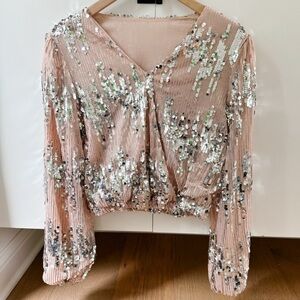Peach colored sequin blouse with silver sequins